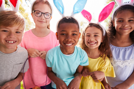 Elementary school students wearing Easter bunny ears