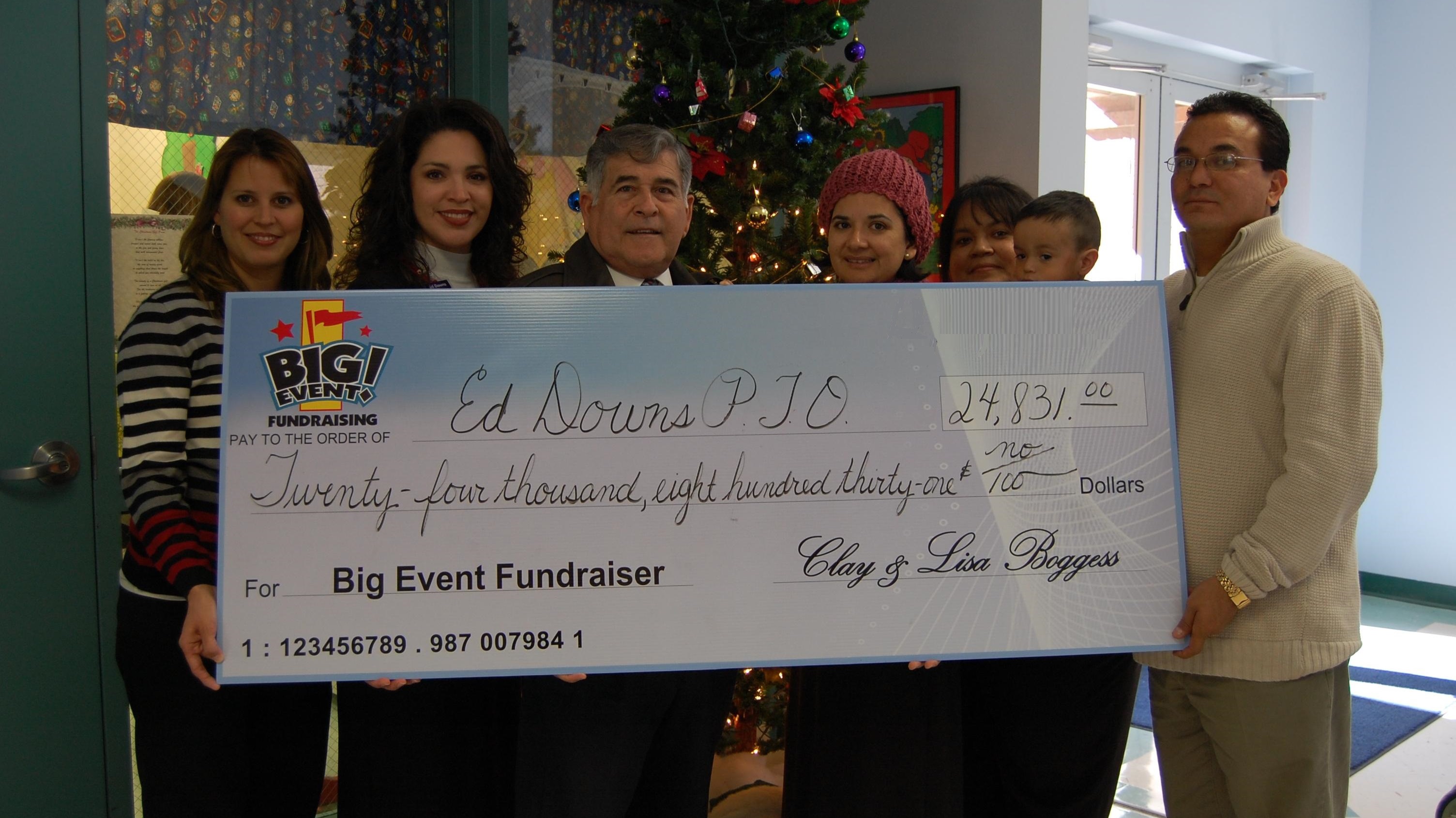 Students Really Enjoy Magic Show Ed Downs Elementary School PTO fundraising team holding check