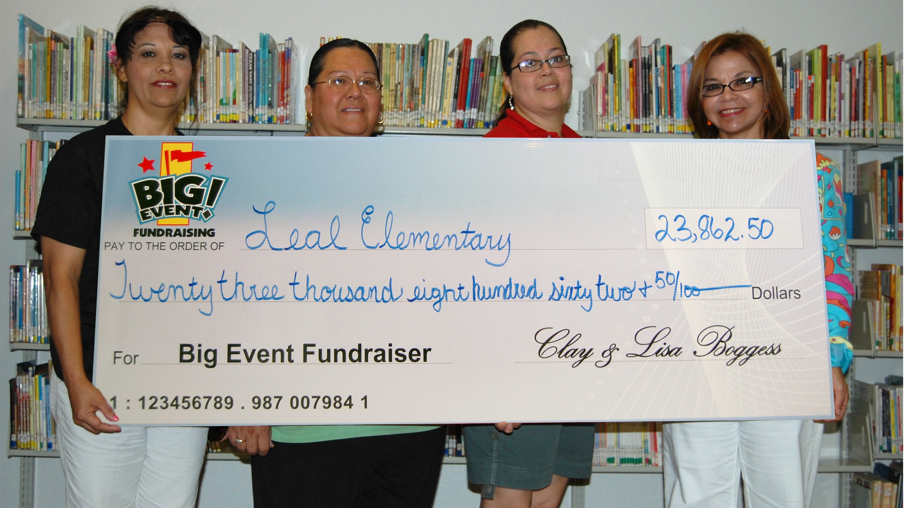 Super Party Makes Fundraiser a Success Leal Elementary School fundraising team holding check