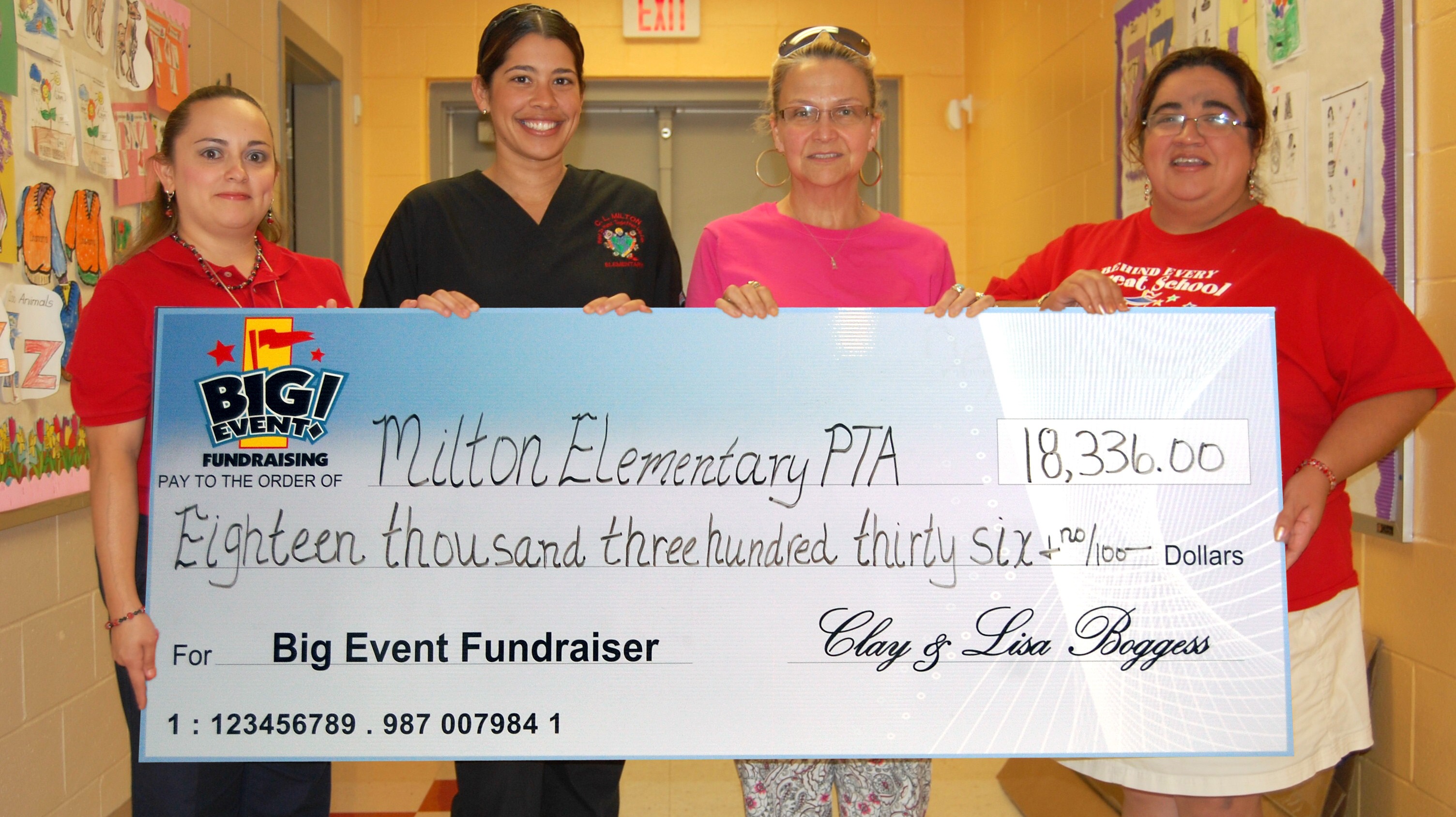 Super Splash Incentive is Added Motivation Milton Elementary School PTA fundraising team holding check