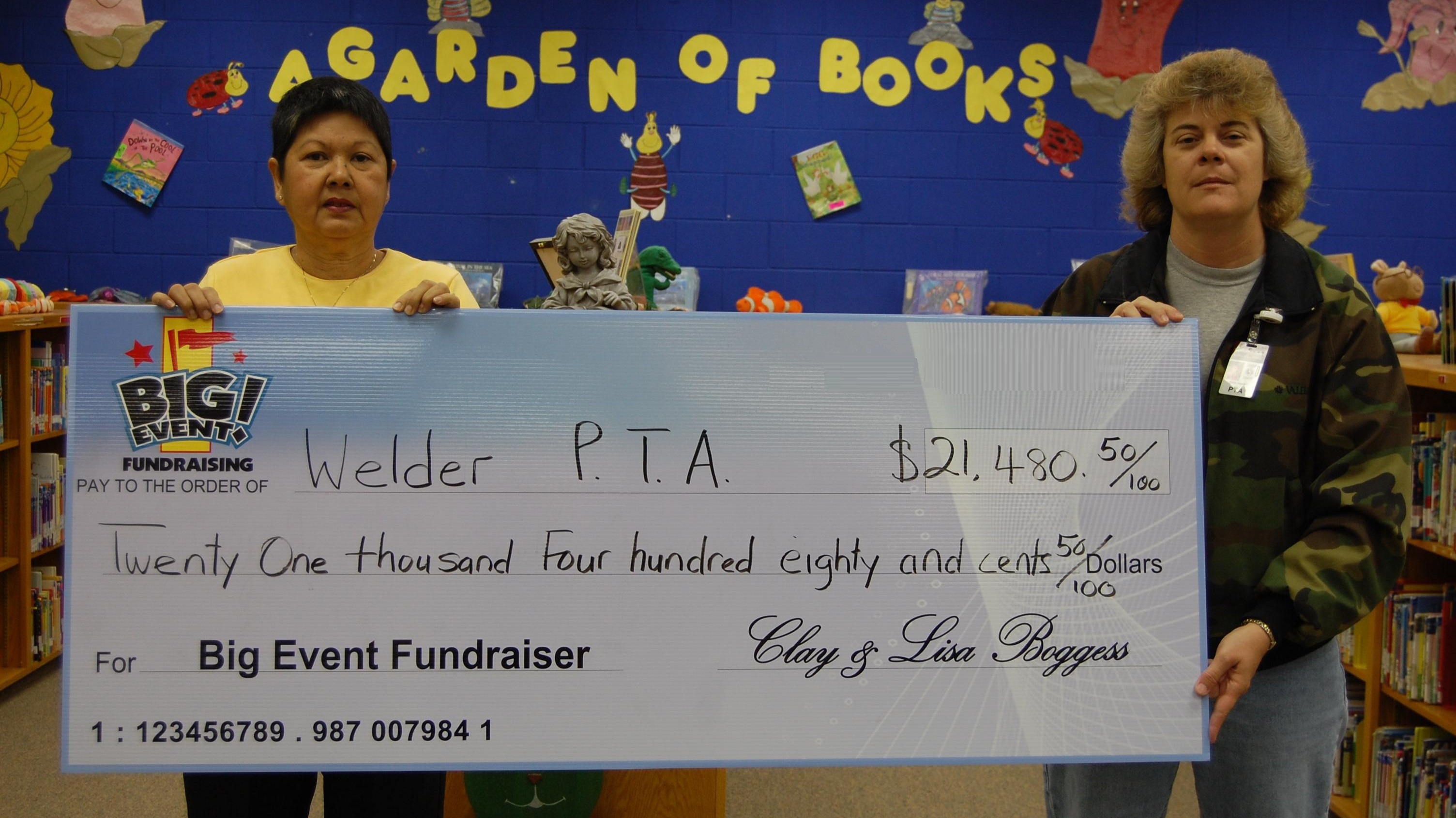 Company Rated Professional by School PTA Welder Elementary School PTA fundraising team holding check