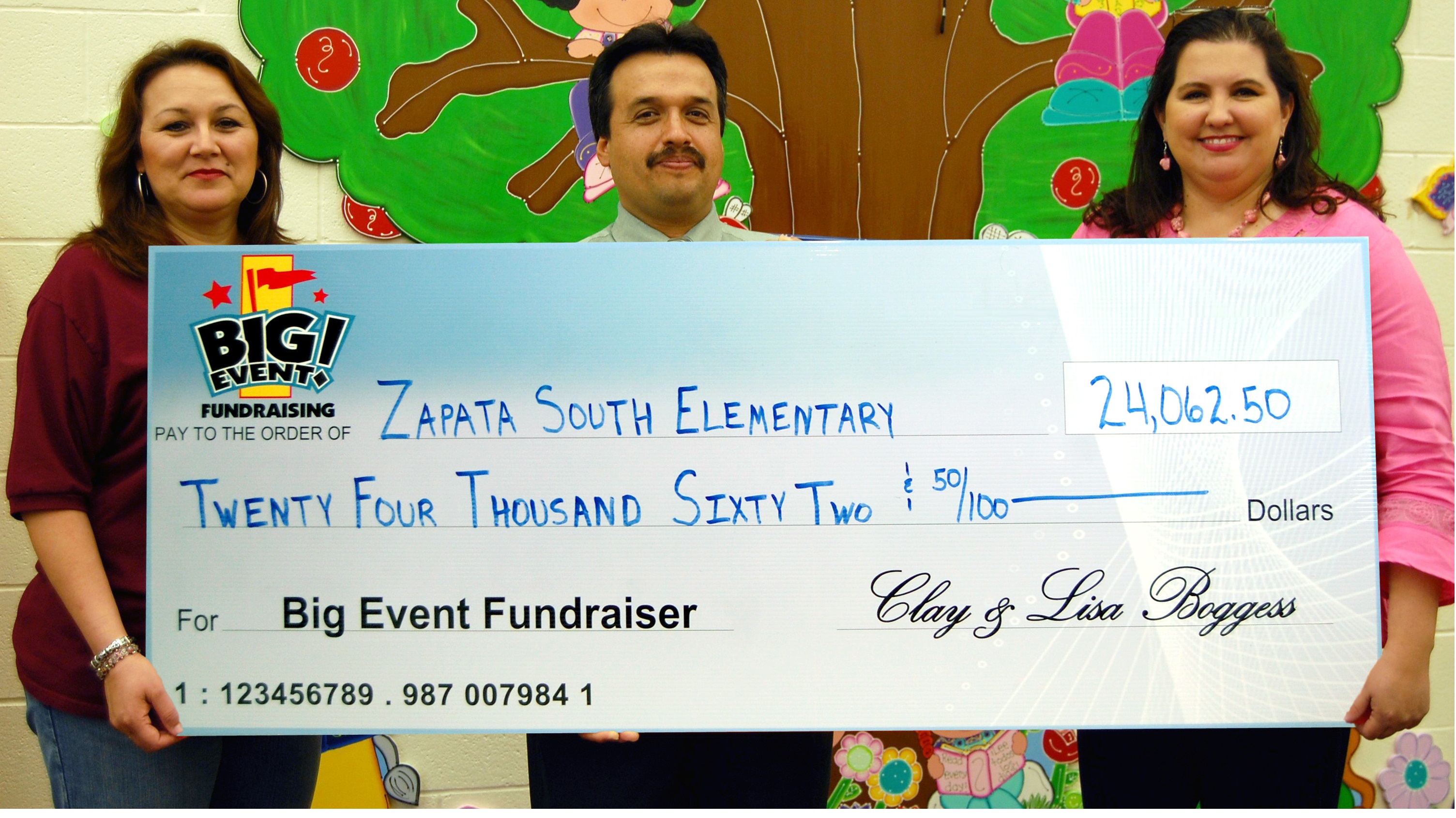 Students Experience Wonderful Super Splash Party Zapata South Elementary School fundraising team holding check