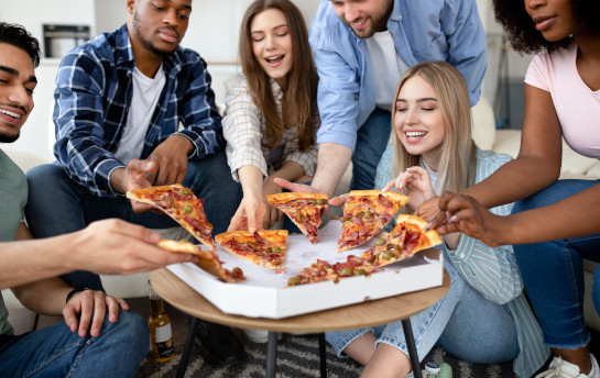 College Students Eating Pizza