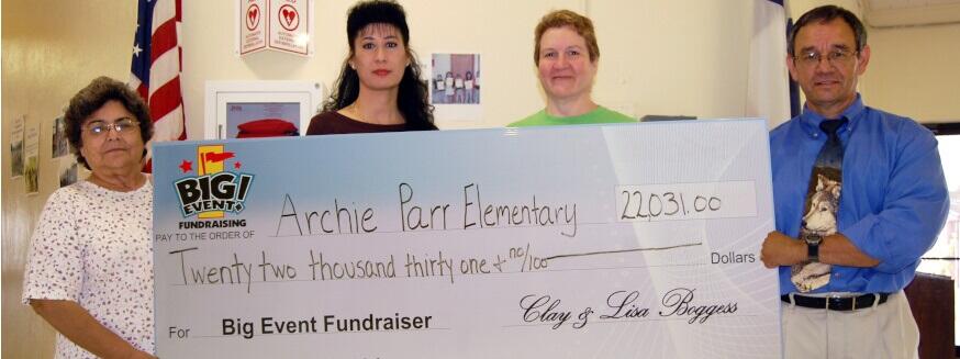 Principal Says Super Party is Excellent Event Archie Parr Elementary School fundraising team holding check