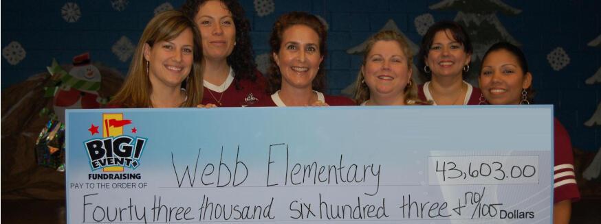 Webb Elementary School fundraising team holding check